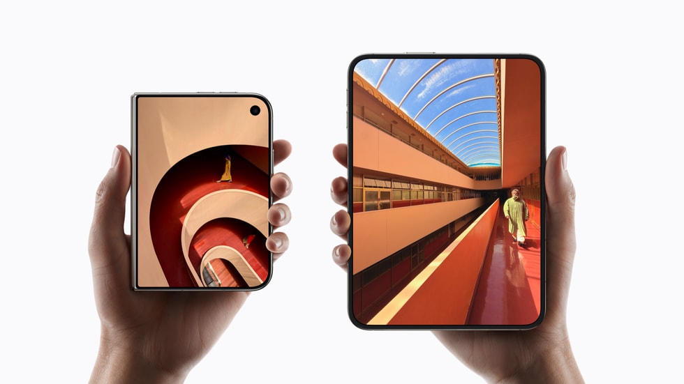 Apple promotional photograph showing the iPhone Duo closed and open in two hands.