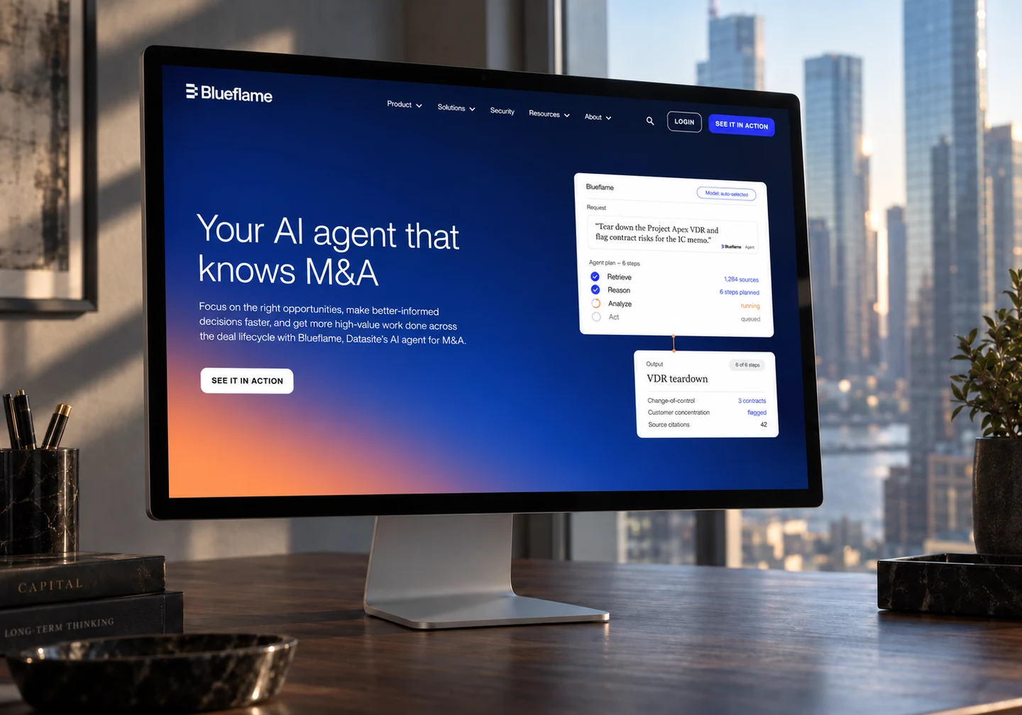 Blueflame’s new homepage and logo on an Apple Studio Display in a city office.