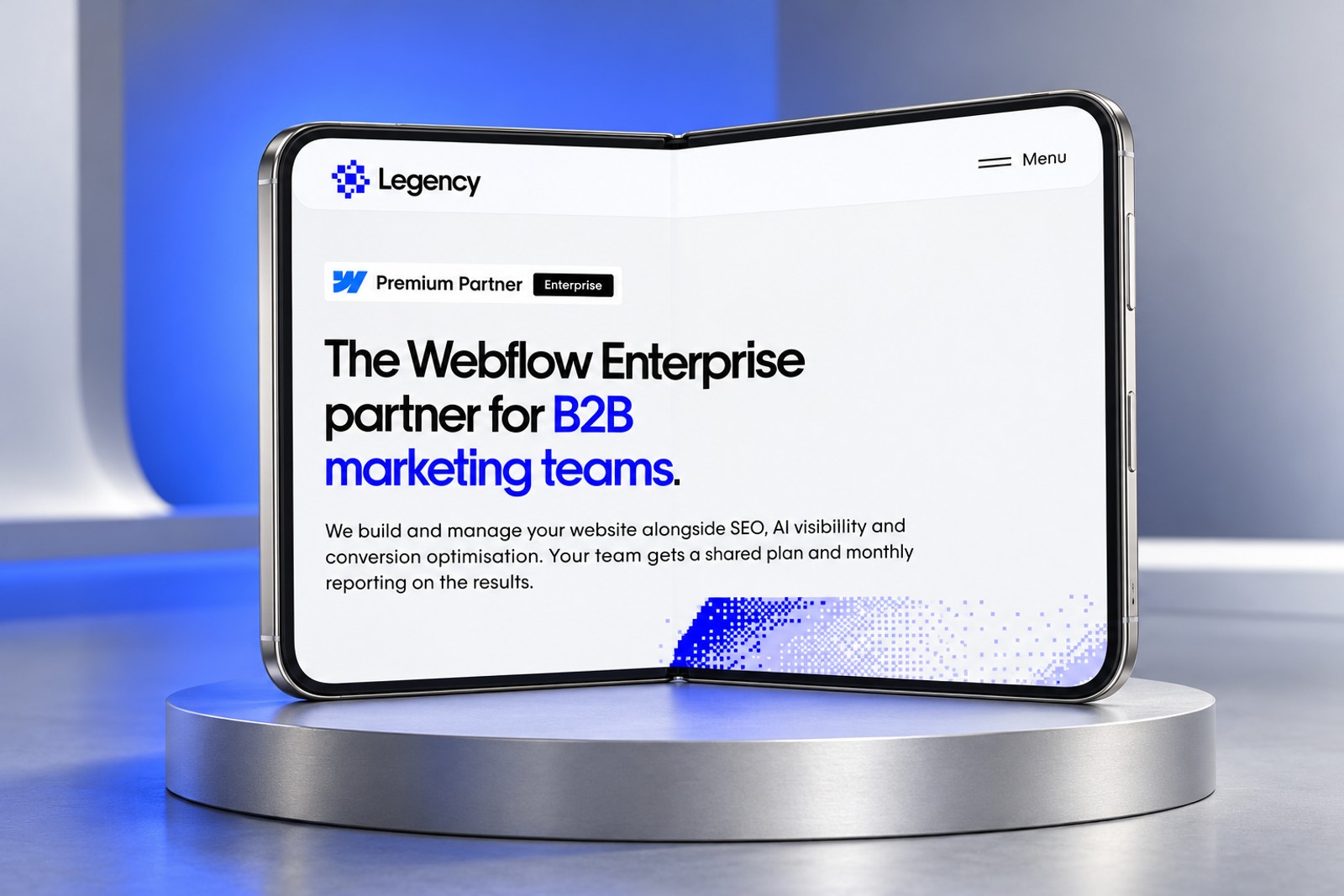 Concept studio mockup of an unfolded iPhone Duo on a silver platform, showing the Legency Media homepage against a blue-lit background